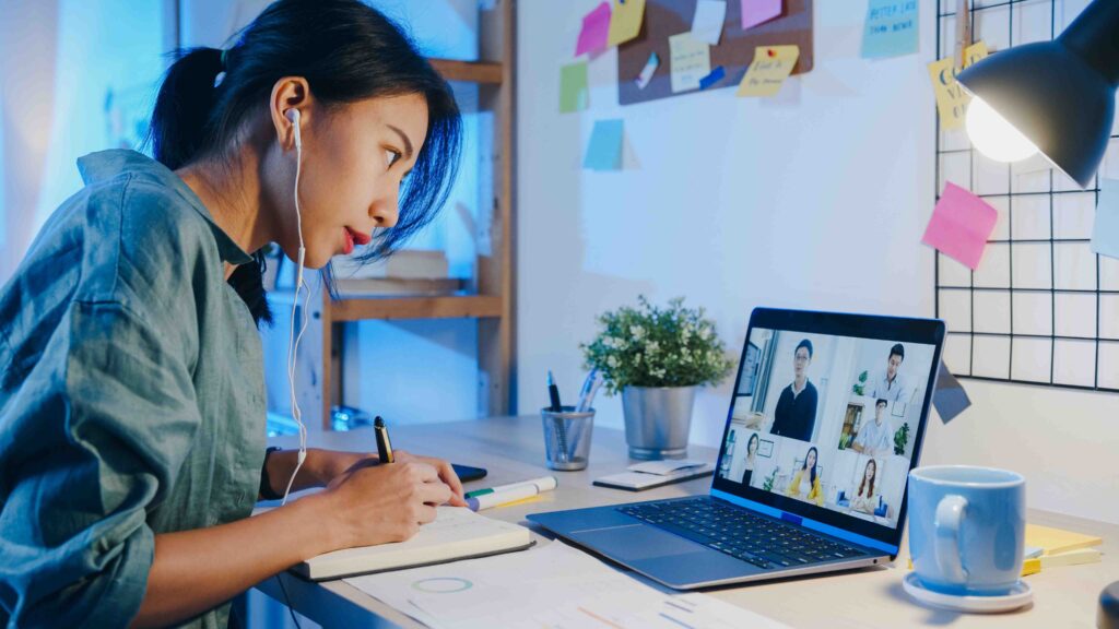 asia businesswoman using laptop talk to colleagues about plan in